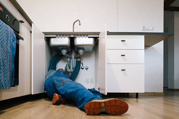 Professional Plumbing technician working in Orange, NJ